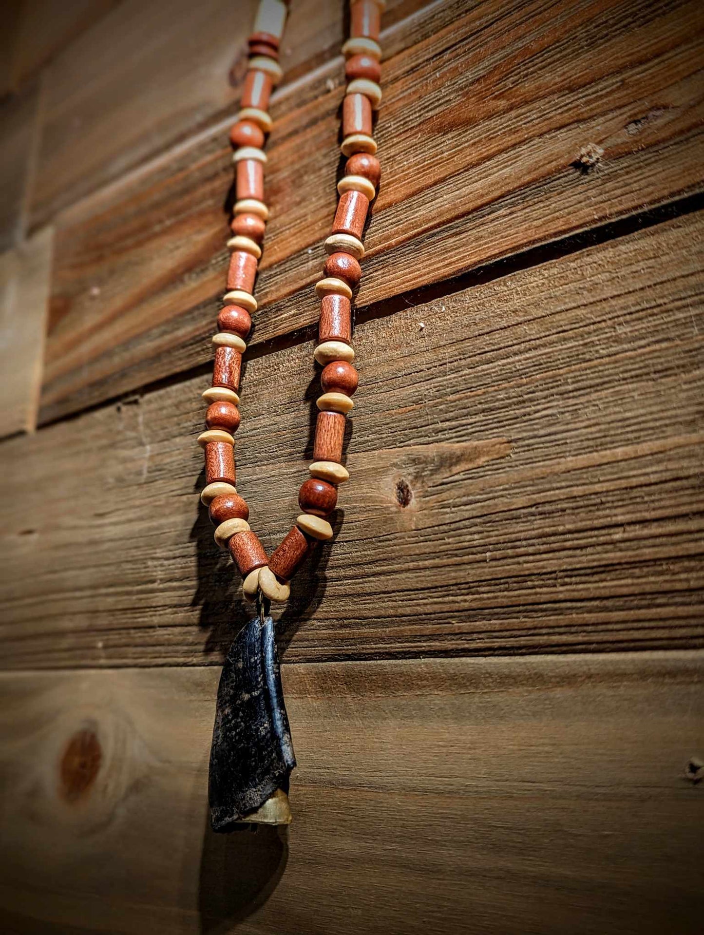 Deer Hoof and Bell Amulet with Wood Beads