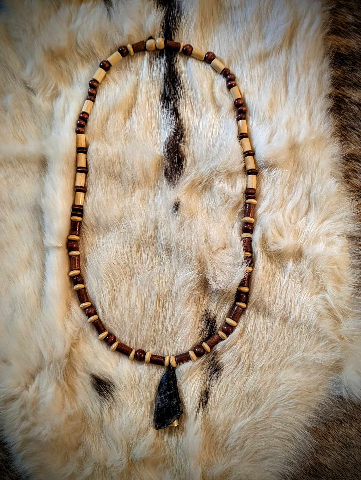 Deer Hoof and Bell Amulet with Wood Beads