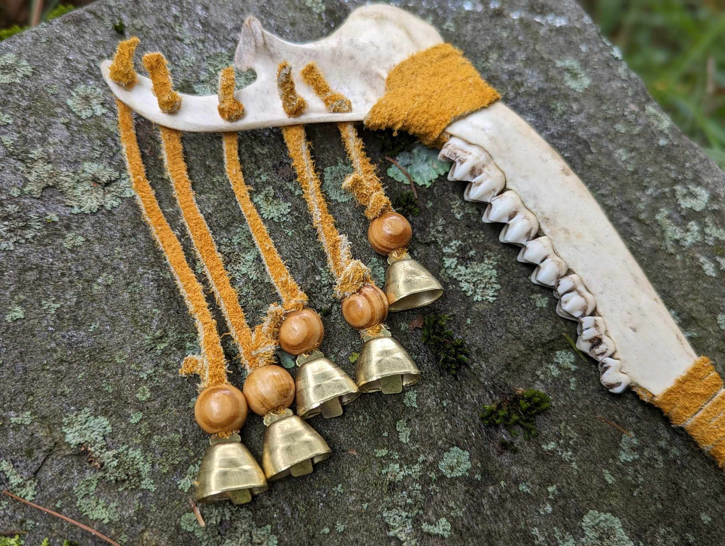 Deer jaw, buckskin, wood bead, 9 bells meditation rattle