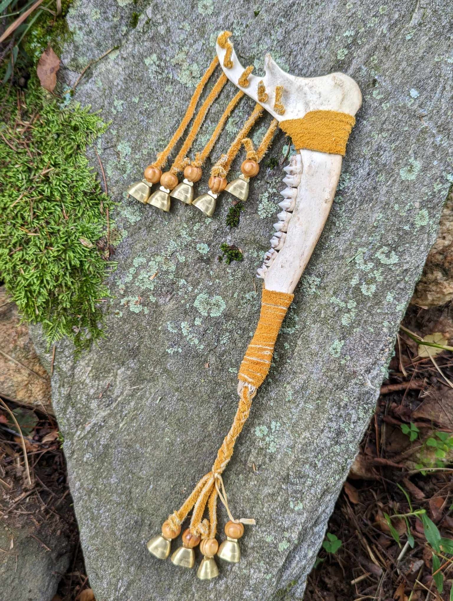 Deer jaw, buckskin, wood bead, 9 bells meditation rattle