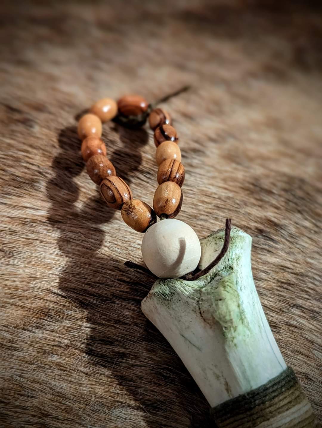 Hickory Nut and Deer Bone Nut Rattle With Wood Bead Hanger