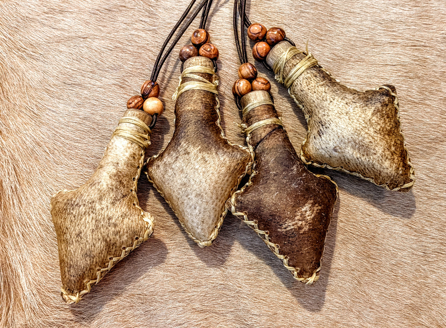 Arrowhead Gungnir Bear Hide Rattle Necklace