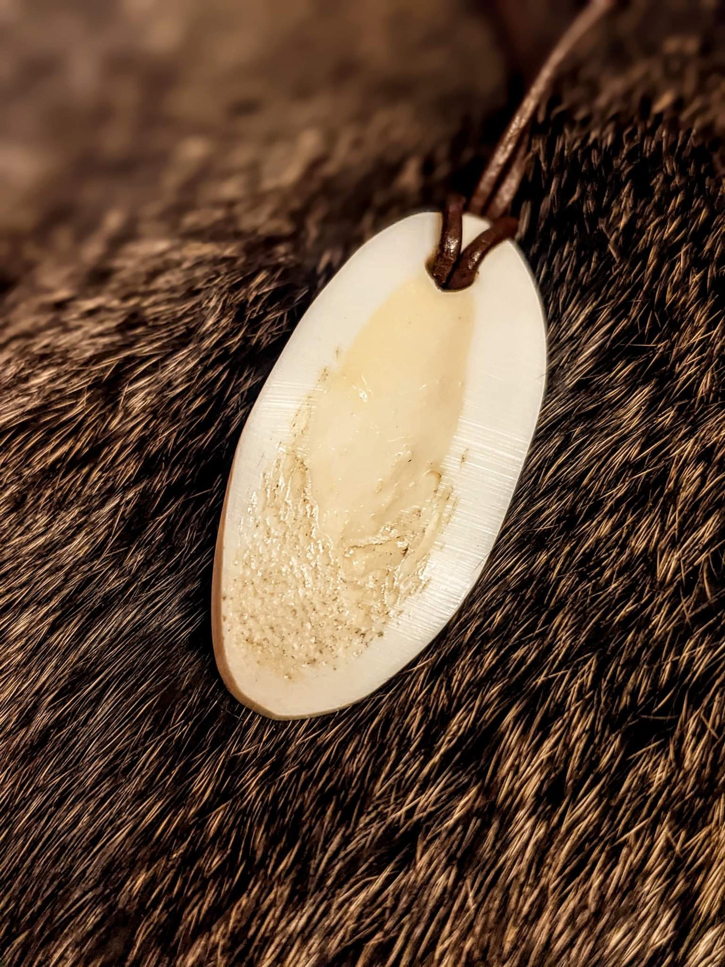 Primitive Hand Carved Elk Bone Odin Pendant