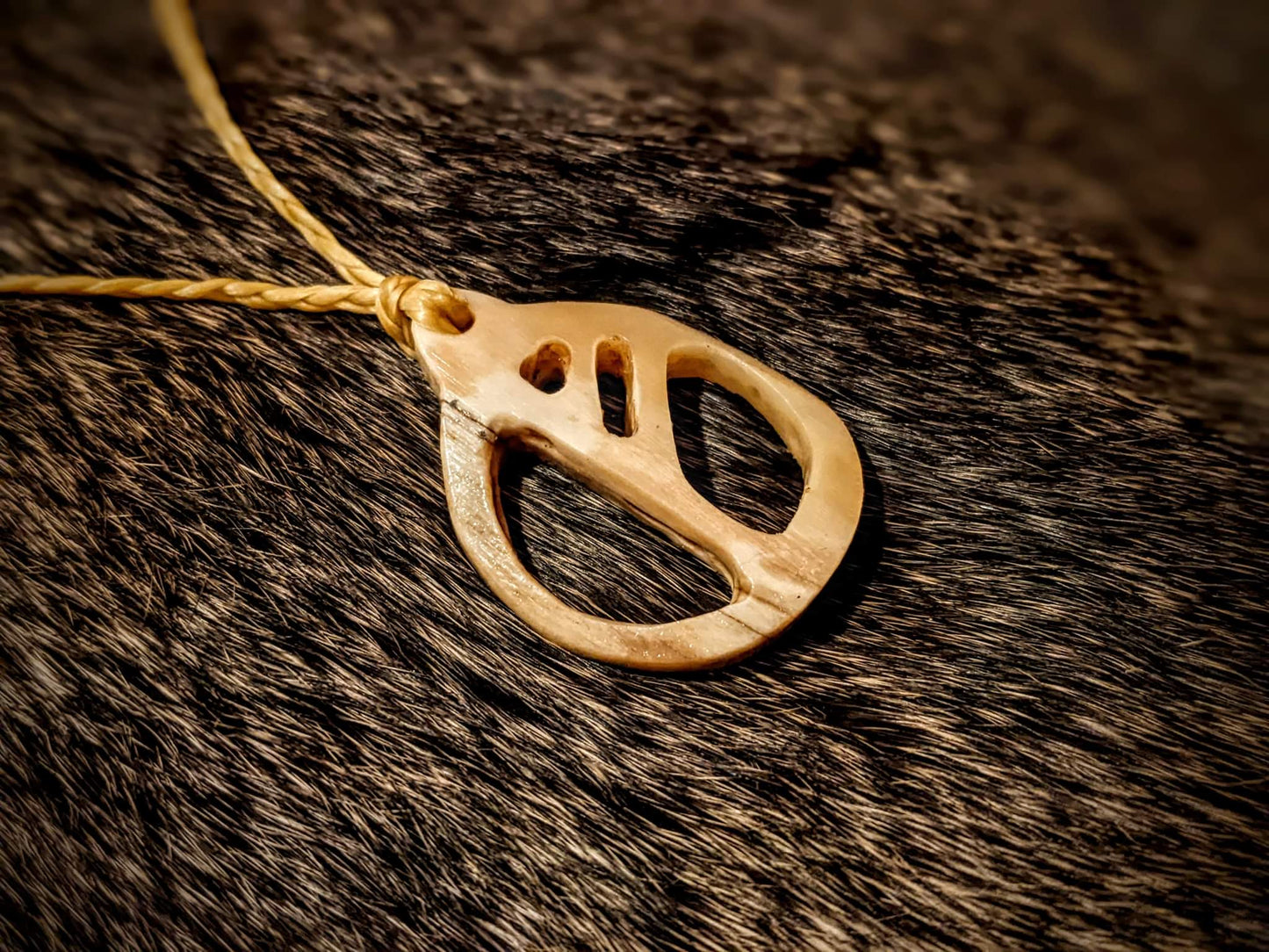 Hand Carved Elk Bone Fehu Pendant on Braided Sinew Cord