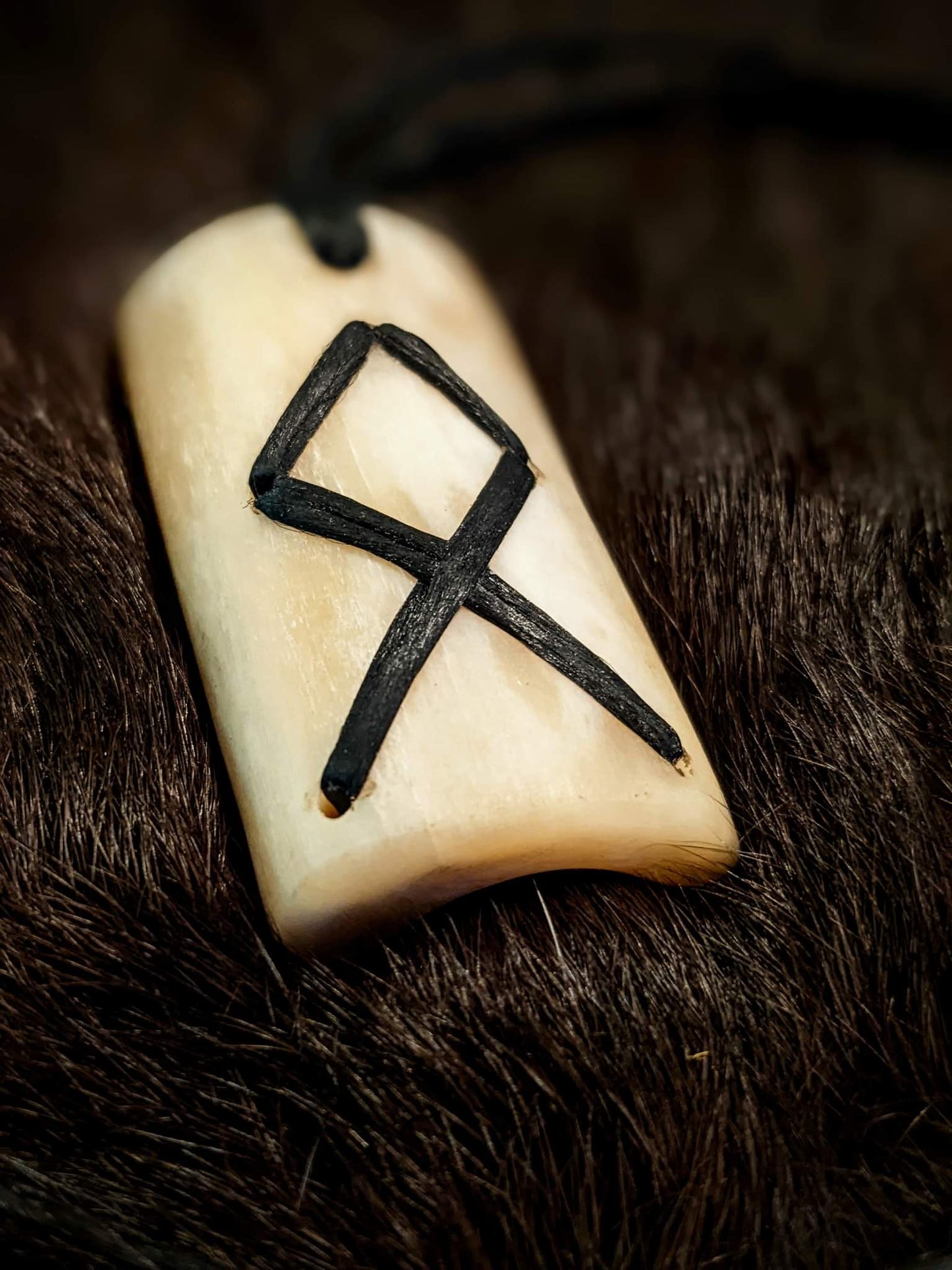 Othala Elk Bone Pendant | Braided Black Sinew Cord