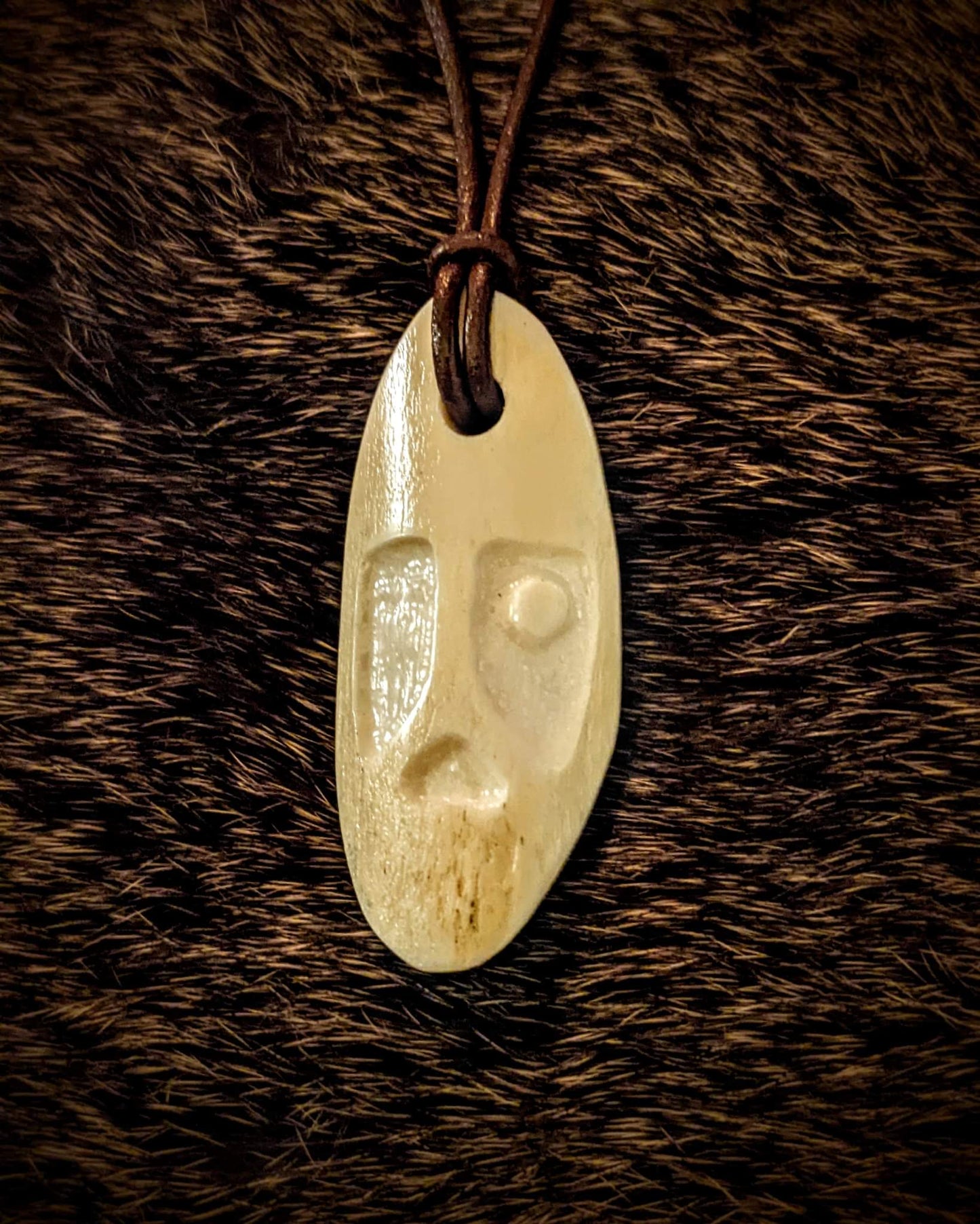 Primitive Hand Carved Elk Bone Odin Pendant