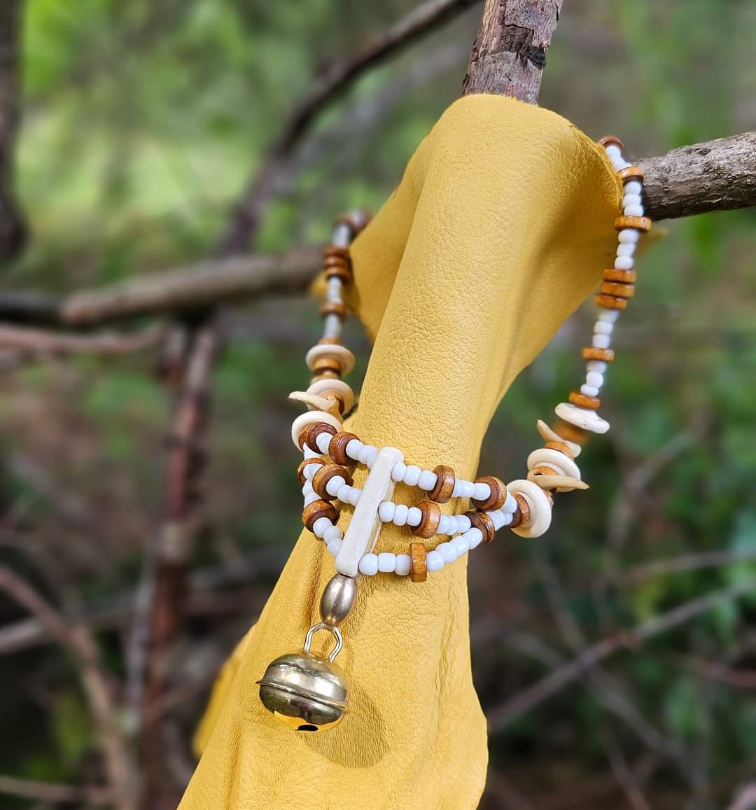 Bobcat Claw, Bone Bead, and Brass Hawk Bell Necklace