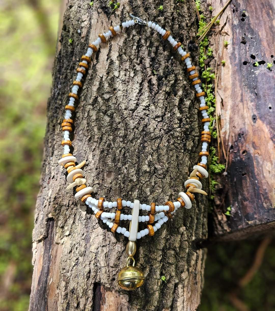 Bobcat Claw, Bone Bead, and Brass Hawk Bell Necklace