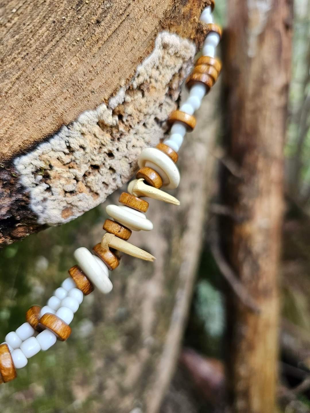 Bobcat Claw, Bone Bead, and Brass Hawk Bell Necklace