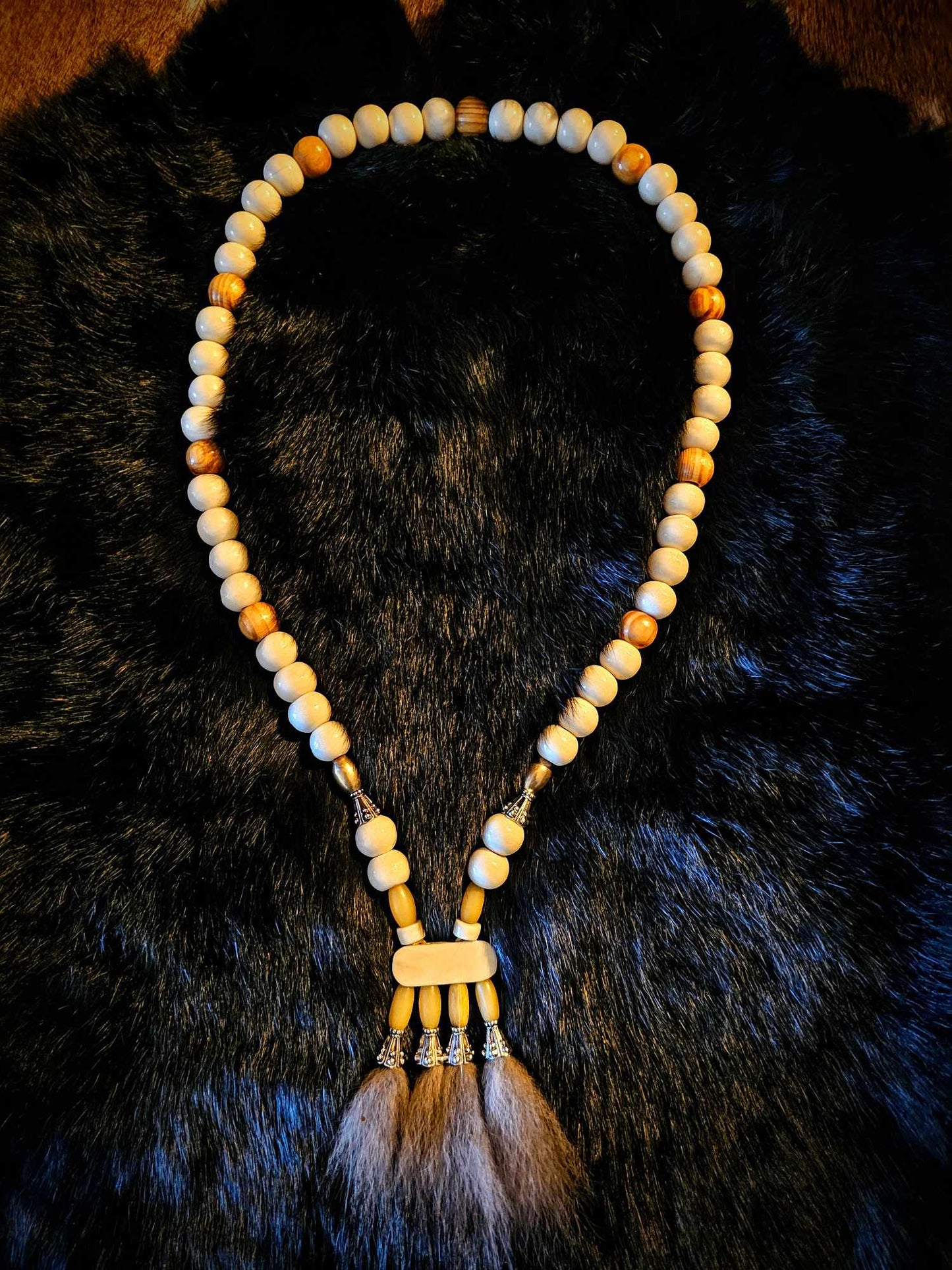 Wolf Fur Pendant with Bison, Cow, Wood, and Metal Beads