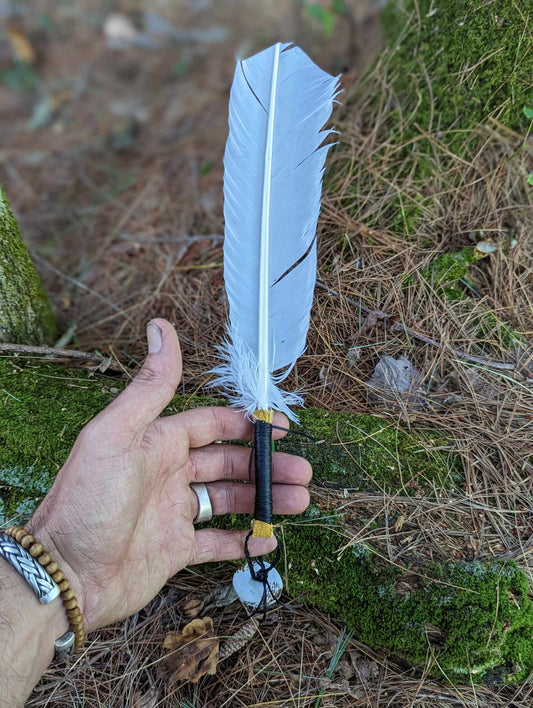 White turkey feather, elk leather wrap, and hand painted bell smoke fan