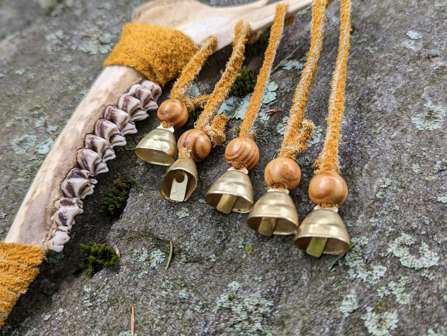 Deer jaw, buckskin, wood bead, 9 bells meditation rattle