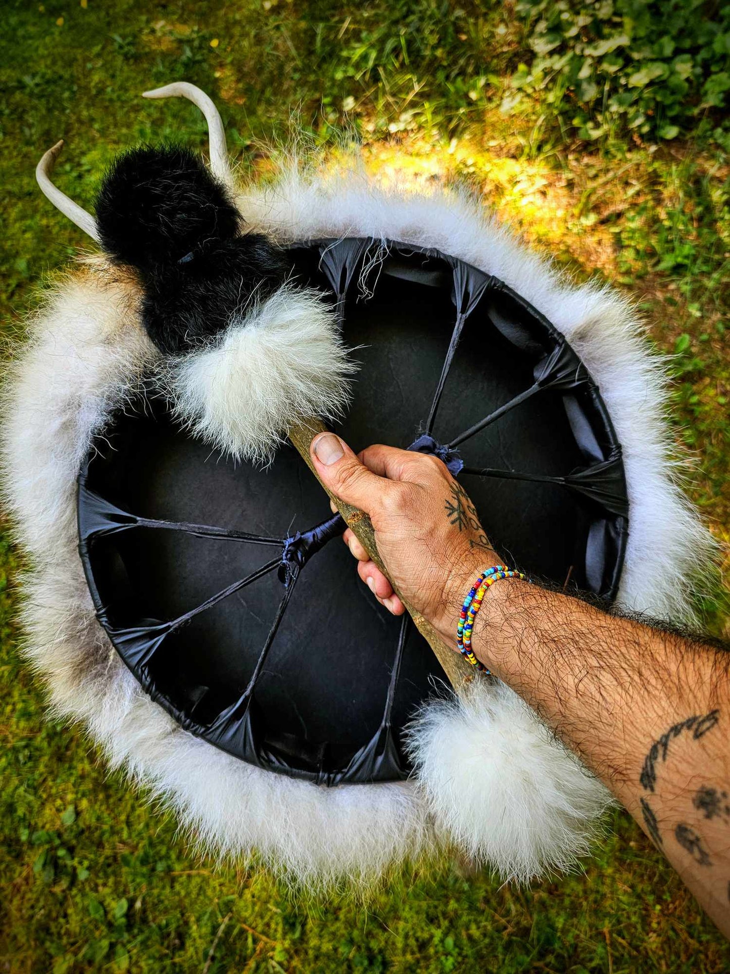 "Sun of All Seasons" Black Deer Hide Drum With Antler, Skull, Coyote and Wolf