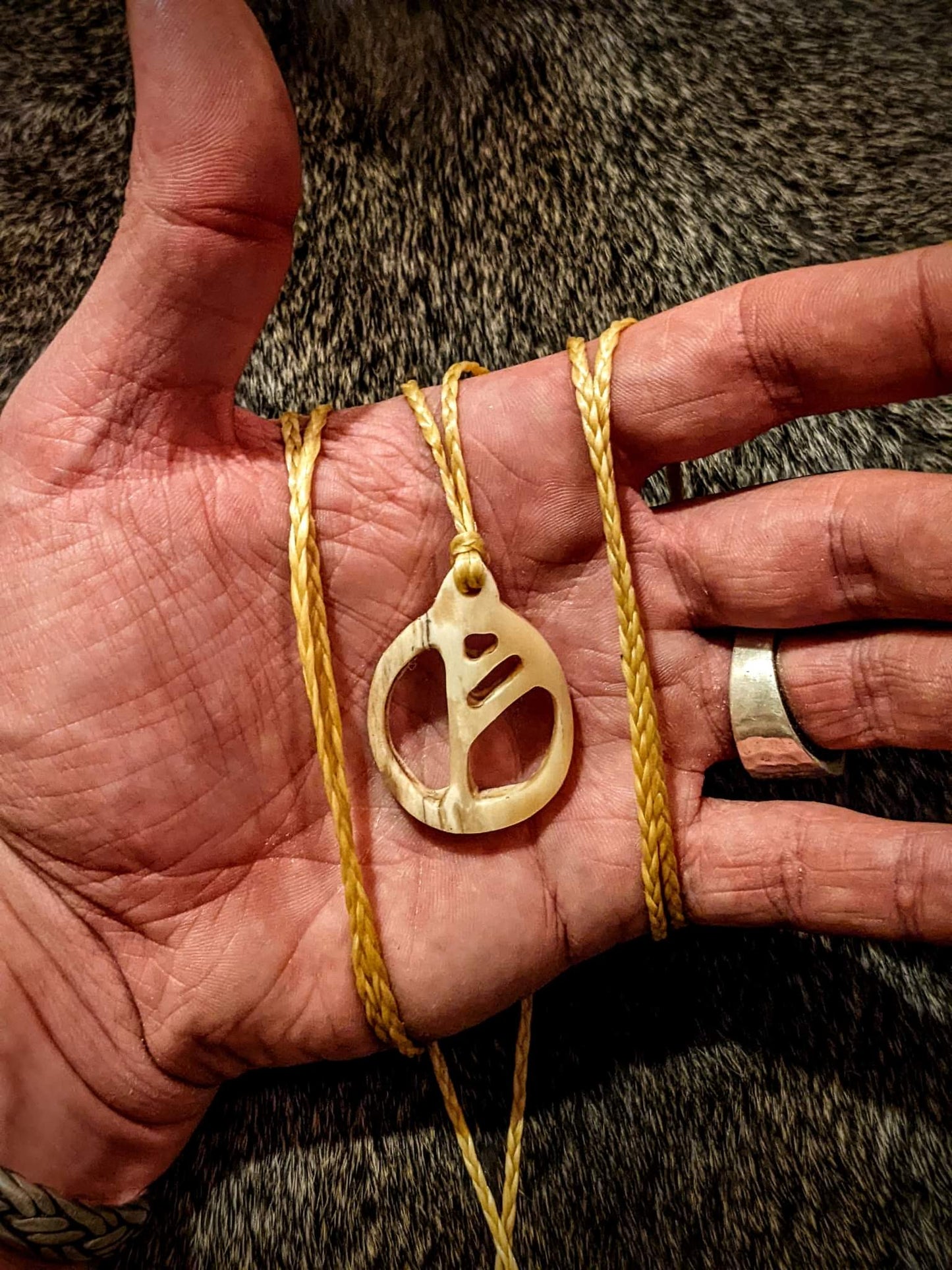 Hand Carved Elk Bone Fehu Pendant on Braided Sinew Cord