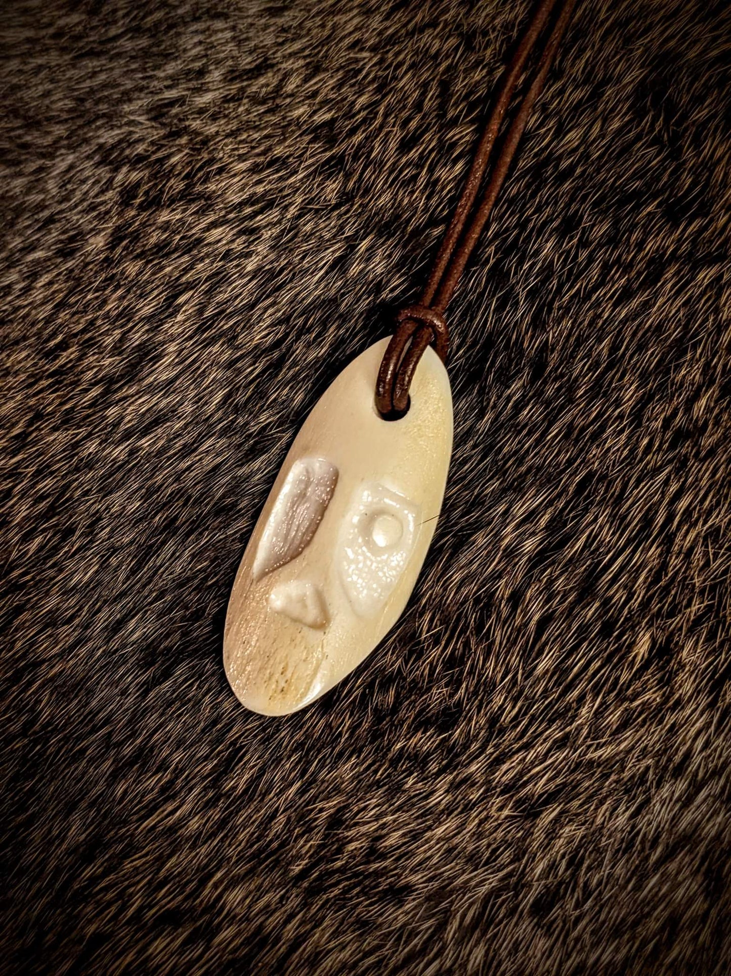 Primitive Hand Carved Elk Bone Odin Pendant