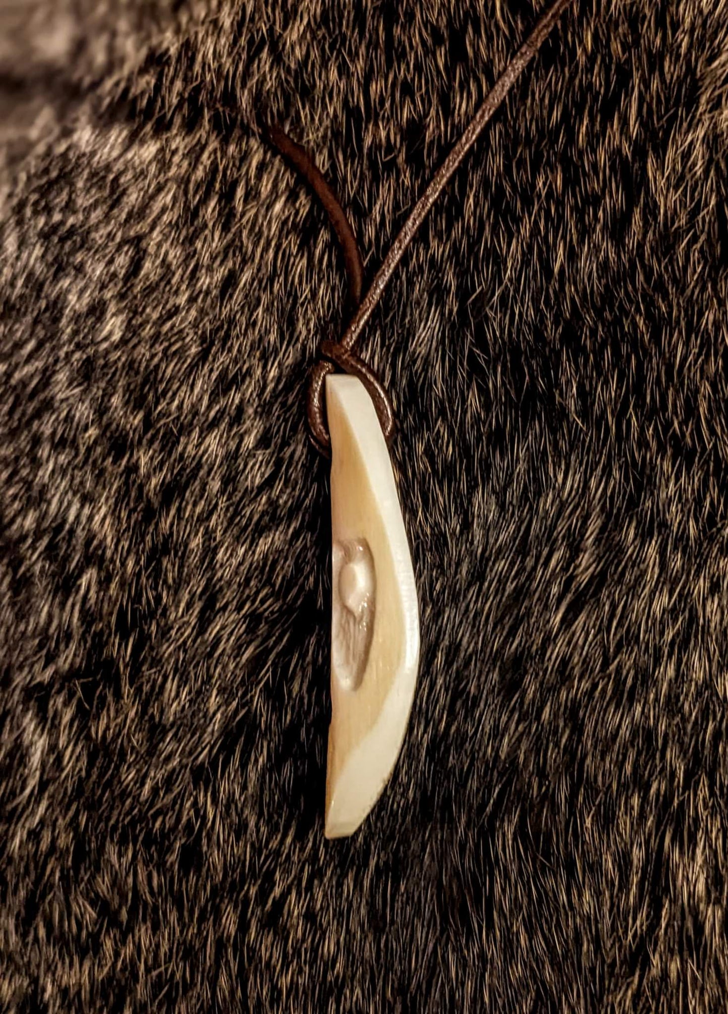 Primitive Hand Carved Elk Bone Odin Pendant