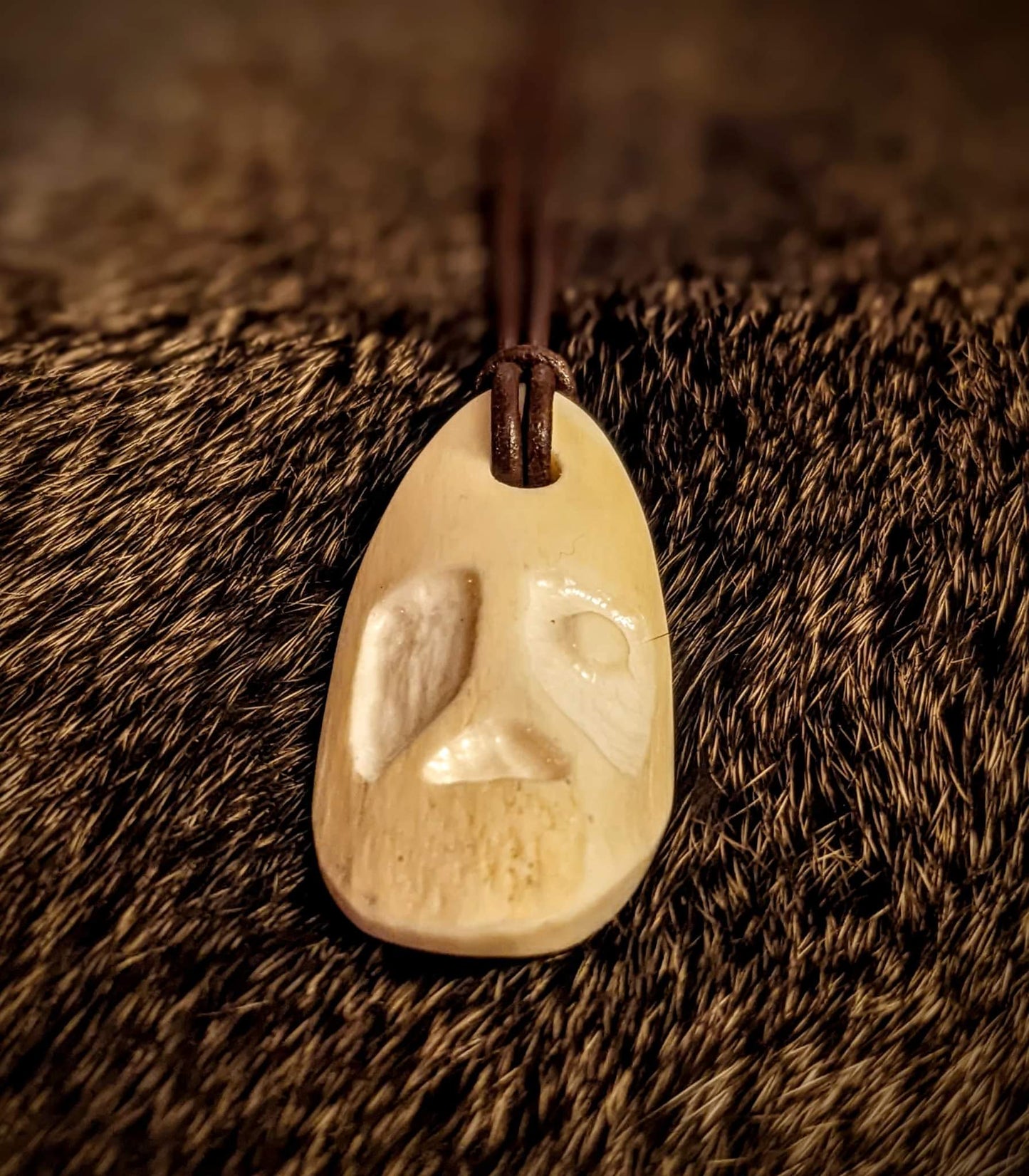 Primitive Hand Carved Elk Bone Odin Pendant