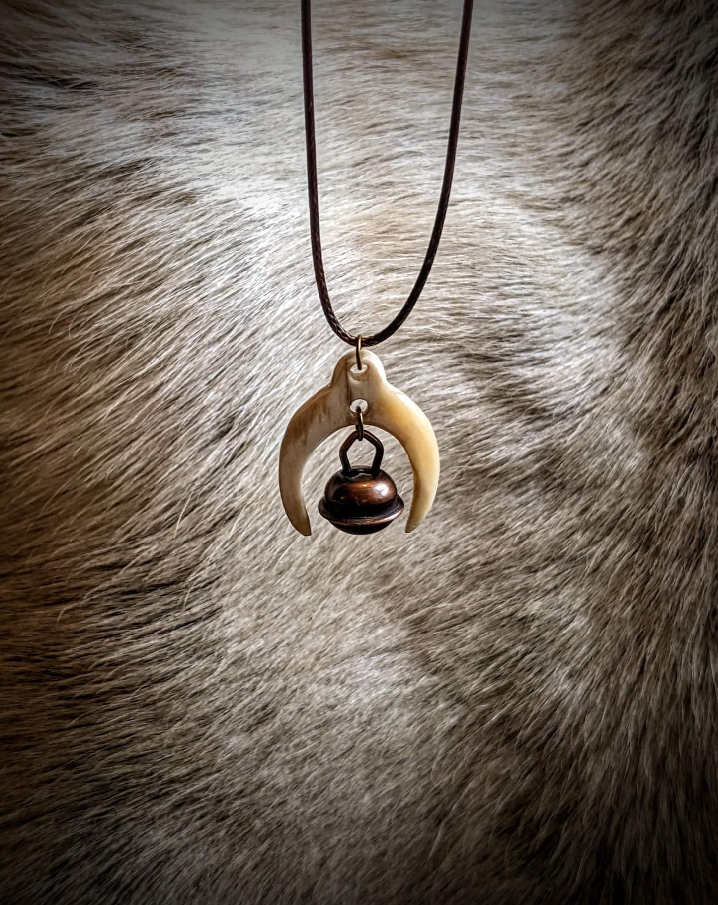 Hawk's Bell and Elk bone Spirit Travel Pendant